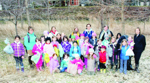 BROWNIES HELP CLEAN UP ALONG RIVER The banks of the Humber River in Bolton looked a lot more presentable recently after these members of 2nd Bolton Brownies went to work. The girls were out picking up litter and garbage in the shore clean-up in anticipation of Earth Week. Photo by Bill Rea