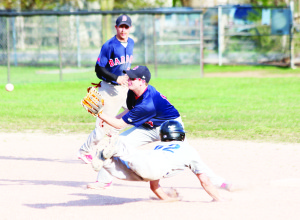 Bolton Dodgers' Tyson Hansen begins his slide into second base as Creemore Barons' Bryce Watson receives the ball during a May 3 contest. Hansen was tagged out on the play. Photo by David Anderson (NDBL)