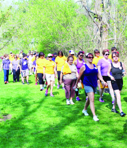 Participants in Saturday's walk made their way along the course from Dick's Dam Park.