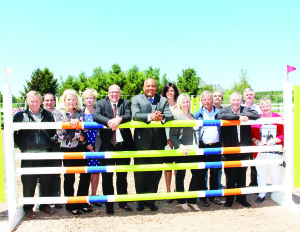 Tourism, Culture and Sport Minister Michael Coteau was at the Caledon Pan Am Equestrian Park in Palgrave last Thursday to announce a $7,500 Provincial grant for the upcoming Pan Am Torch festivities in Town. Those on hand for the announcement included Councillors Gord McClure, Rob Mezzapelli and Barb Shaughnessy, Caledon's Director of Parks and Recreation Laura Johnston, Mayor Allan Thompson, Coteau, Councillors Johanna Downey and Jennifer Innis, Equestrian Management Group Managing Partner Craig Collins, Councillors Nick deBoer and Doug Beffort, Hills of Headwaters Tourism Association Chair Stacey Coupland and Mike Fenning, associate director of property and risk management for Toronto and Region Conservation Authority.
