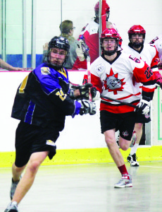 Caledon's Jordan Oshowy winds up for a shot against the Halton Hills Bulldogs last Tuesday. The Bandits lost 8-5.