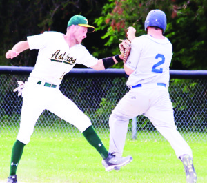 Dodger Sam Totty is tagged out at first base in Sunday's 3-1 loss to the Lisle Astros on Sunday.