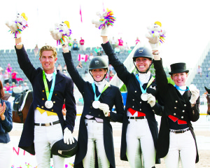 The Canadian Dressage Team won the silver medal at the Pan American Games. The team members are Chris von Martels, Brittany Fraser, Megan Lane and Belinda Trussell. Photo by Cealy Tetley