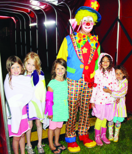 Youngsters attending the circus were thrilled to meet clowns like Topsy. His fans here were Rachel Ader, 8, Adelle McDougall, 7, Ashley Ader, 6, Luka Hessing, 6, and Elle Hessing, 5.
