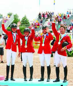 Kathryn Robinson, Jessica Phoenix, Colleen Loach and Waylon Roberts won the team bronze for Canada in eventing. Photo by Bill Rea