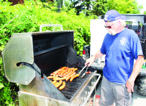 There was lots of food available, courtesy of the local firefighters. Firefighter Don Hillson was pitching in at the barbecue.