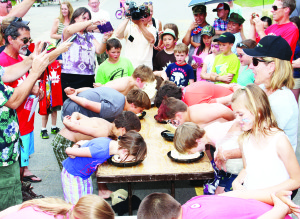 Who taught these kids table manners? There were many of the old favourite attractions at Cheltenham Day, including the pie-eating contest There was lots of enthusiasm in the audience as these competitors were being cheered on. Photos by Bill Rea