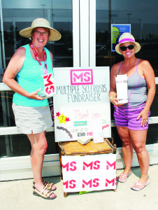 RAISING MONEY TO FIGHT MS For the seventh year, Cedar Mills resident Julie Dranitsaris was heading up a recent weekend fundraising drive to fight Multiple Sclerosis at the Bolton Walmart SuperCentre. Dranitsaris herself was not there, but there were others ready to help out, including her mother Janet Muir and Andrea Bates from Mississauga. Her father Steve reported the effort raised $7,811.30 (including the Walmart matching grant), and she has raised more than $12,000 this year. The total for seven years is nearing $77,000. Photo by Bill Rea