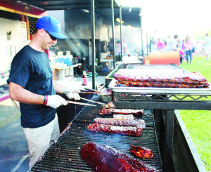 Derek Buchanan was busy getting the ribs ready at The Chop Shop.