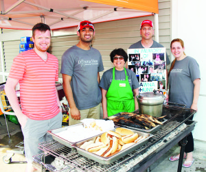 DAWNA HUNT FUNDRAISER AT ZEHRS Staff at the Zehrs store in Bolton were busy barbecuing recently for the second annual Dawna Hunt fundraiser. Ms. Hunt worked at the store for 21 years before dying of lung cancer at 41 in June 2014. Manager Marco Cesarone said they surpassed their goal to raise $15,000. He is seen here with Leigh Parker, Rahan Iqbal, Olivia Perch and Stephaie Sluman. Photo by Bill Rea