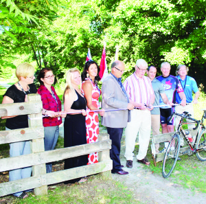 Mayor Allan Thompson and Dufferin-Caledon MP David Tilson were celebrating the funding announcement for the Caledon Trailway, accompanied by Parks and Recreation Director Laura Johnston; Landscape Project Coordinator Tina Fernandes; Councillors Jennifer Innis, Johanna Downey and Rob Mezzapelli; Wayen Noble, representing Caledon Hills Cycling; and Manager of Parks and Landscape Architect Brian Baird. Photo by Bill Rea