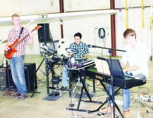 Kontact consists of Andrew Boettger on bass, Mitchell Greenham on drums and Matthew Boettger on keyboards. The Caledon performers were providing music before the Light Up the Runway event.