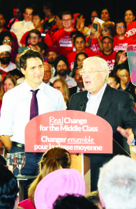 Liberal Leader Justin Trudeau and former prime minister Paul Martin addressed a hall full of enthusiastic supporters in Brampton recently. Photo by Bill Rea