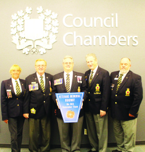 Members of the Royal Canadian Legion were on hand for last Thursday;s discussion at Regional counil on designating Dixie Road Veterans Memorial Roadway. Seen here are Marg Porter of the Port Credit branch; Jack Porter, deputy district commander; Benjamin Pearce, secretary of the Streetsville branch; Ola McNutt, deputy zone commander and president of the Streetsville branch; and Walter Stevens of the Cooksville Branch. Photo by Bill Rea