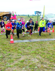 The weather looked a little threatening, but it couldn't dampen the enthusiasm of those on hand for the fourth annual Caledon Pit Run last Saturday, hosted jointly by Lafarge and Aecon. The event was held in support of Bethell Hospice Foundation, and organizers report they raised $26,500, better than the $25,000 target. These young folks were on their way in the one-kilometre event. Photos by Bill Rea