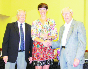 Headwaters Board Chair Rob Hamilton and Dr. David Scott flank Dr. Amy Catania, recipient of the Dr. David Scott Award.