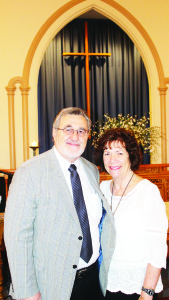 NEW PASTOR TAKES OVER Belfountain Village Church recently officially insalled Fred Dyke as the new pastor Seen here with his wife Judee, who leads the congregation in music and praise, he has been acting pastor at the church since Easter. Photo by Bill Rea