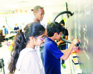 Gurnoor Soor, Daniel McCarthy, Anish Warrier and Keerat Ghuman were starting to put the finishing touches on their creation.