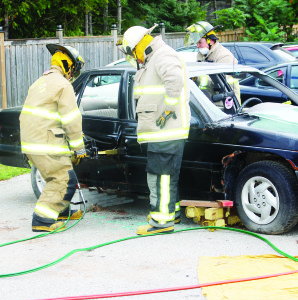 Firefighters put on a demonstration on how they extract people from cars at accident scenes.