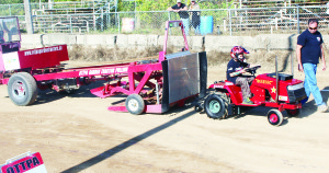 The Garden Tractor Pull went ahead Sunday morning. Jamie Dicks, 10, of Palgrave, pulled the sled 147 feet.