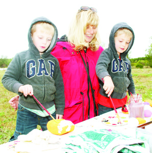 Debbie Shaw of Bolton was watching as her grandchildren Jaxon and Dechlan Stevenson of Wasaga Beach were painting stones.