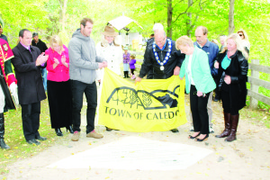 Mayor Allan Thompson was on hand Saturday to help Jake and Beverly Holden unveil their stone on Caledon's Walk of Fame. Also seen here are Councillor Rob Mezzapelli, Dufferin-Caledon MPP Sylvia Jones and Councillors Barb Shaughnessy, Nick deBoer and Jennifer Innis. Photo by Bill Rea