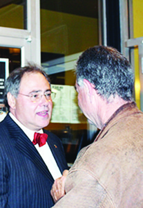 Liberal candidate Ed Crewson was talking with supporters after Monday's election results were in.