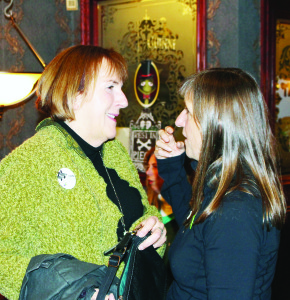 Green Party candidate Nancy Urekar conferred with her campaign manager Bernadette Hardaker after arriving at her post-election party in Orangeville.