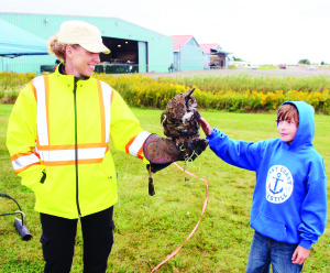 The attractions included some interesting specimens from Bird Control Services Inc. Rita Watermann was showing this nine-year-old great horned owl named Hewlitt to Justin Watts, 10, of Hillsburgh.