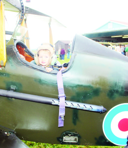 The Great War Flying Museum had some of its aircraft on display, including this British SE 5A. Harrison Yurek, 2, of Guelph was able to get a feel for the cockpit.