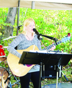 Melyssa Kerr, formerly of Belfountain, was providing some of the musical entertainment.