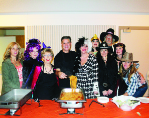 SPAGHETTI DINNER FOR HALLOWEEN There was spaghetti being served up, as well as crafts and other fun activities at last Friday's masquerade party at Caledon Community Complex. The annual event was being put on by the Caledon East Revitalization Committee. Photo by Bill Rea