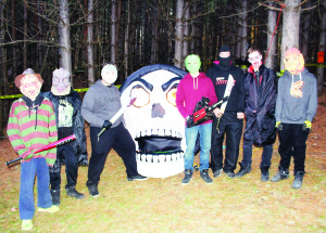 FRIGHTENING WAY TO RAISE MONEY The computer room at Holy Family Elementary School in Bolton will be benefitting from the proceeds of this haunted forest that was operated Friday and Saturday night at the Staffiere home in Cedar Mills. It was a combined effort by students at St. Michael Catholic and Humberview Secondary Schools. Seen here in various costumes are Benjamin Huxtable, Michael Rhone, Adam Staffiere, Joseph Quadrini, Shelby Watts and Lucas Lance. Photo by Bill Rea