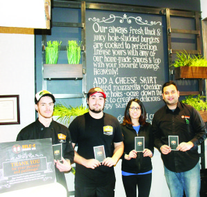 Aunny Singh (right) is seen here with Luca Pascale, Matthew Campanella and his wife Kiran Kaur.