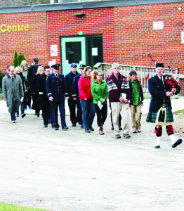 Piper Mike Melnyk led the procession at Sunday's ceremony in Mono Mills.