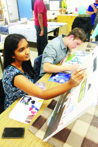 Art students Urja Nandivada and Max Minuzzo were woking on creations during the open house.