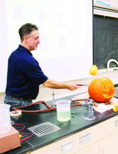 There was plenty of activity last Thursday night at Humberview Secondary School. It was the annual night for Grade 8 students who are planning to attend the school next year and their parents to see some of what high school life is like. There were lots of displays in the various class rooms. Science teacher Edmund Sestini had an entertained audience as used this pumpkin to demonstrate some experiments.