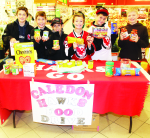 HAWKS FOR HUNGER COLLECT FOOD Caledon Hawks minor hockey teams were taking part in a Hawks for Hunger food drive. These members of the atom AA team were out collecting contributions recently at the Zehrs store in Bolton. Seen here are Joseph Picheca, Luca Rosati, Jordan Calvano, Evan gilchrist, Anthony Taritano and Christopher Sharples. Photo by Bill Rea
