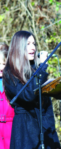 Carly Cianflocca sang the Anthems at the Bolton service.