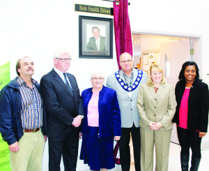 Becky Smith was accompanied by Caledon Councillor Nick deBoer, Dufferin-Caledon MP David Tilson, Mayor Allan Thompson, MPP Sylvia Jones and Councillor Annette Groves at Friday's dedication of a room at Caledon Seniors' Centre in memory of her late husband Bob. Photo by Bill Rea