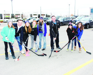 SUPPORTING GIRLS' HOCKEY Water Depot in Bolton hosted a Home Team Hockey Day at its Parr Boulevard facility recently. Players in the Caledon Coyotes house league were on hand for the activities. Seen here are Paige Smyth, Coach Ryan Smyth, Ashley Smyth, Riley Noble, Assistant Coach Charlene Noble, Water Depot owner Evan Rousseau, Aysia Maurice and Lexy Maurice. Photo by Bill Rea