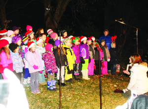 The Rotary Club of Palgrave hosted their annual tree-lighting in the park recently night and a lot of the people in the community were out for the festivities, which included music, a visit from Santa Claus and the actual lighting of the tree. Members of the Palgrave Public School Primary Choir were performing songs of the season, under the direction of Donalda Richardson. Photos by Bill Rea