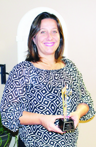 BUSINESS WOMAN OF THE YEAR Shannon Turnbull of the Mortgage Centre in Bolton was named Business Woman of the Year recently by the Caledon Chamber of Commerce. The announcement was made at the recent Chamber's Stilettos and Stars celebration, and she said she had no idea ahead of time she would be getting the award. “I was honoured,” she said. “I was grateful to receive it.” She added she and her team at the Bolton office have worked hard to get where they are. “I'm thankful for the team that I have,” she said. Photo by Bill Rea
