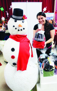 It takes more than snow to make a real snowman, so Tina Cipressi of Oro-Medonte was selling Smowman Kits, complete with all the other required accessories.