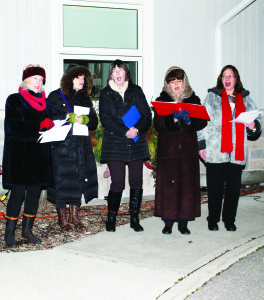 Members of the Young and Heart Carollers led the procession, and performed during the ceremony.