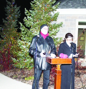 Jake McArthur, who's daughter stayed at the Hospice for a period, and Elizabeth Birnie, daughter of Loran Bethell, who established the facility, spoke the names of people who were being remembered. Photos by Bill Rea