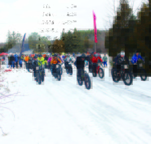 Some people can't get in enough mountain biking in the traditional season, but there's always fat biking in the winter. Some 200 people were out for Saturday's Fat Bike Festival at Albion Hills Conservation Area, run by Superfly Racing. Jay Ennis, a member of the support crew, explained a fat bike is like a mountain bike, except it the frames have been adjusted to accommodate wider tires with heavy treads to deal with the snow encountered on the trails. The tires are about four to four-and-a-half inches wide. The main event was divided in two heats.Above, the men 50 and older, along with the women, head out on the 20-kilometre race. 