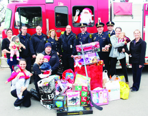 PROCEEDS OF FOOD AND TOY DRIVE DELIVERED Caledon Fire and Emergency Services had been running a food and toy drive at various facilities and locations. Fire Chief David Forfar and other members of the service were on hand recently to deliver the contributions that had been accumulated. Photo by Bill Rea