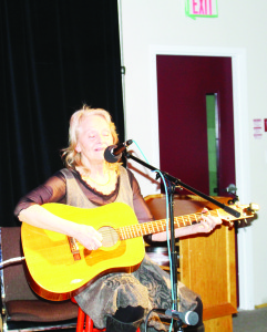 Palgrave area resident Freda Wrench entertained with some tunes on the guitar.