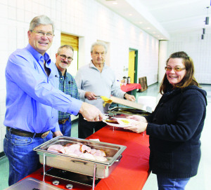 Mayfield United Church hosted their annual Pancake Supper at the Brampton Fairgrounds. Philip Armstrong, Ian Armstrong and Bob Persant were serving Heather Reid Smith her dinner.